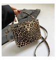 Glossy leopard print handbag for women featuring a gold V-shaped metal clasp - Yellow Leopard (6174)