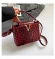 Elegant red and black leopard print handbag with gold V-buckle and adjustable strap - Red Leopard (6174)