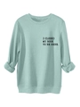 Detail of sage green sweatshirt showing ribbed cuffs and text print I Closed My Book - Light Green
