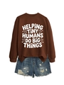 Close-up of brown sweatshirt with 'Helping Tiny Humans' text and ripped denim shorts - Coffee (White Font)