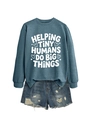 Detail of teal sweatshirt featuring white text print and distressed denim shorts - Blue (White Font)