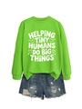 Flat lay of green crewneck sweatshirt with slogan and distressed denim shorts outfit - Neon Green (White Font)