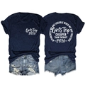 Flat lay of Girl's Trip 2026 navy t-shirt with ripped denim shorts with fringe - Navy Blue (White Font)
