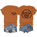 Detail of Girl's Trip 2026 orange cotton t-shirt paired with ripped denim shorts - Burnt Orange (Black Font)