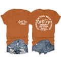 Detail view of burnt orange t-shirt with Girls Trip 2026 print and denim shorts - Burnt Orange (White Font)