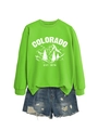 Detail of Colorado printed neon green sweatshirt with denim shorts on white backdrop - Fluorescent Green (White Print)