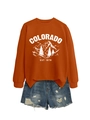 Detail of Colorado Est 1876 print on orange sweatshirt with distressed denim shorts - Burnt Orange (White Print)