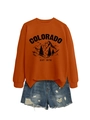 Close-up of rust orange Colorado sweatshirt featuring ribbed cuffs and side slit details - Burnt Orange (Black Print)