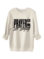 Dettaglio della stampa 'PRAYER IS MY Love Language' nera su felpa in pile color crema - S / Sabbia