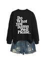 Flat lay of black crewneck sweatshirt with white slogan and distressed denim shorts - Black (White Font)