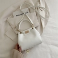 Elegant white litchi textured Kelly style mini crossbody bag with gold clasp and top handle - White