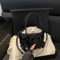 Fashionable black sequin bucket bag with drawstring inner pouch and silver chain strap - Black