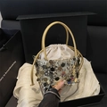 Silver sequin drawstring bucket bag with gold handle and silk lining in a gift box - Gold