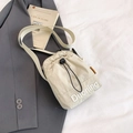 Beige nylon drawstring crossbody bag with Duoning embroidery and adjustable strap - Off White