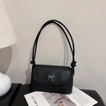 Elegante borsa a tracolla in pelle sintetica nera con fiocco in argento e spalline annodate - Nero