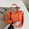 Vibrant orange nylon mini tote bag with panda pendant and wide adjustable shoulder strap - Orange