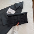 Quilted black clutch bag in padded nylon fabric with elegant golden metal ring accents - Black