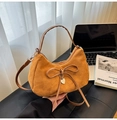 Ginger yellow suede crescent bag with bow detail and heart pendant in variant style - Brown