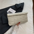 Chic quilted cream cosmetic clutch bag with gold button closure and padding - White