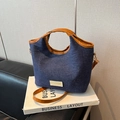 Sac seau en denim bleu foncé avec poignées en cuir marron et bandoulière réglable - Bleu/Brun Bordure (Brun)