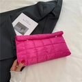 Quilted rose pink cosmetic pouch with gold buckle detail and glossy square stitching - Rose Red