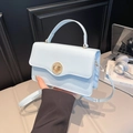 Sac à bandoulière chic bleu clair en similicuir avec fermoir rotatif doré et poignée - Bleu