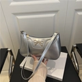 Chic silver underarm bag with golden bow metallic accent in Y2K vintage style - Silver