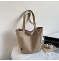 Minimalist khaki canvas tote bag featuring front pocket for daily commute and study - Khaki