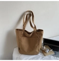 Minimalist camel canvas tote bag with front pocket and shoulder straps for daily use - Caramel color