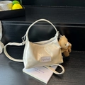 Creamy white patent leather shoulder bag with a cute bear charm and top handle strap - Creamy White (With Pendant)