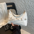 Minimalist white leather crescent underarm bag with gold hardware and strap detail - White