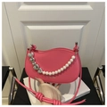 Chic Barbie pink saddle bag with heart charms and white faux pearl chain handle - Pink