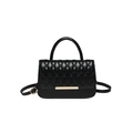 Minimalist black quilted flap crossbody bag with honeycomb texture and gold metal buckle - Black