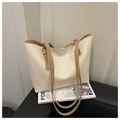 Detail of adjustable khaki straps and metal buckle on off-white large tote bag - White