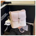 Detail of crossbody bag with heart buckle, glitter flap, and pink cartoon patterns - Pink with Pendant