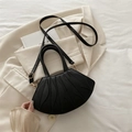 Minimalist black fan-shaped crossbody bag with leaf-like pleats and gold hardware - Black