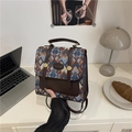Retro woven backpack with colorful geometric patterns and dark brown faux leather trim - Blue