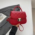 Chic red quilted leather crossbody bag with gold twist lock and adjustable strap - Red