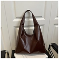 Detail of a large glossy chocolate brown faux leather tote bag with a soft pleated texture - Glossy Coffee (2015)
