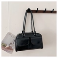 Detail of glossy black shoulder bag with silver hardware and dual front flap pockets - Black