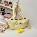 Borsa a tracolla in tela gialla con ricamo a fumetti e ciondoli a forma di piedi - Giallo