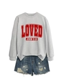 Detailed look at the grey crewneck sweatshirt with red LOVED print and denim shorts - Gray