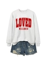 Flat lay of a white crewneck sweatshirt with red LOVED print and distressed denim shorts - Off-White