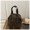 Corduroy tote bag featuring a bold leopard print and durable brown fabric handles - Leopard Coffee