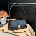 Elegant black underarm bag with glossy crocodile texture and golden metal buckle - Black