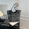 Large black leather tote bag with white graffiti patterns and long shoulder straps - No Pendant / Black