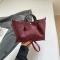 Retro burgunderrote Tragetasche mit Leopardenmuster aus Wildleder und Griff - Rot