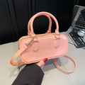 Bolso Boston rosa de gelatina con acabado brillante y correa ajustable para mujer - Rosa