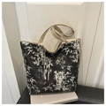 Detail of Chinese style waterproof tote bag featuring artistic white bamboo ink patterns - Black