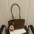 Dark brown faux leather leopard print tote bag with lettering and plush keychain charm - Coffee with Pendant